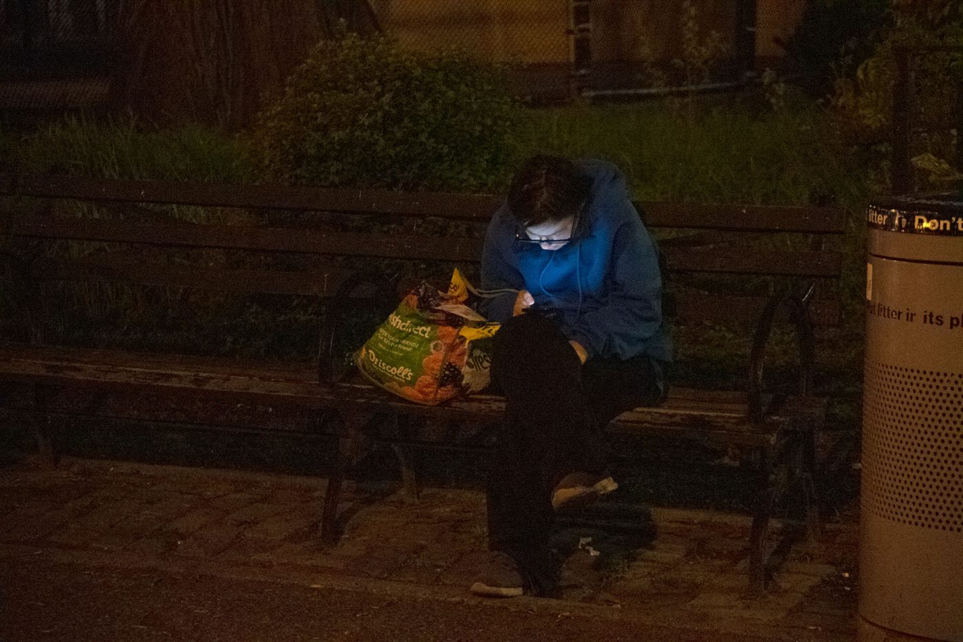 Lady with Phone on Bench